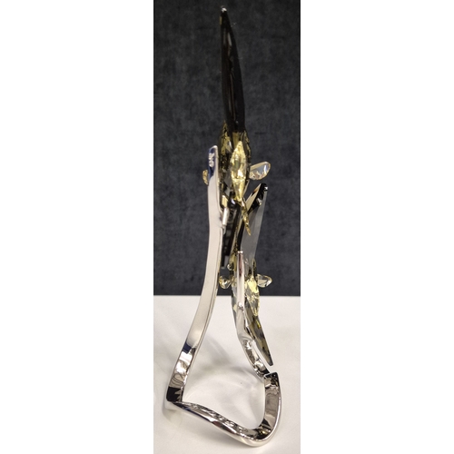 7008 - Swarovski model no: 1036571 - Smoky Batfish Pair

This serene pair of elegant Swarovski Batfish seem... 