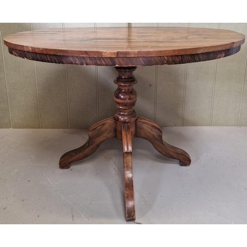 2750 - A Victorian, Walnut breakfast table on a pedestal base. Non-tilting design. Dimensions(cm) H73, W110... 