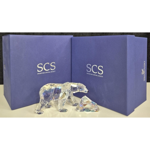 7089 - Swarovski model no: 1053154 2011 Siku Polar Bear with Iceberg Plaque

This retired Swarovski crystal... 