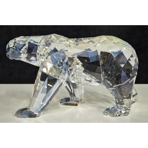 7089 - Swarovski model no: 1053154 2011 Siku Polar Bear with Iceberg Plaque

This retired Swarovski crystal... 