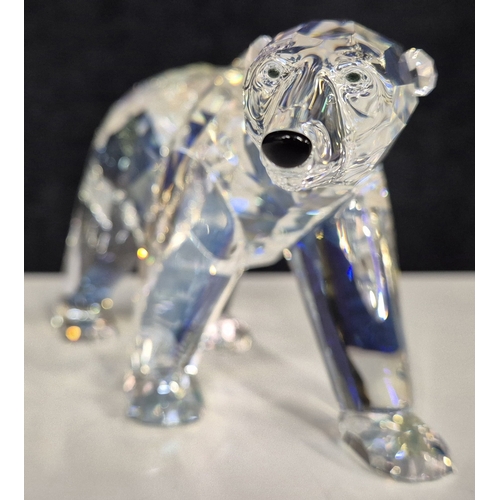 7089 - Swarovski model no: 1053154 2011 Siku Polar Bear with Iceberg Plaque

This retired Swarovski crystal... 
