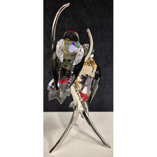 7083 - Swarovski model no: 957562 Paradise Birds - Woodpeckers Black Diamond

These retired Swarovski cryst... 