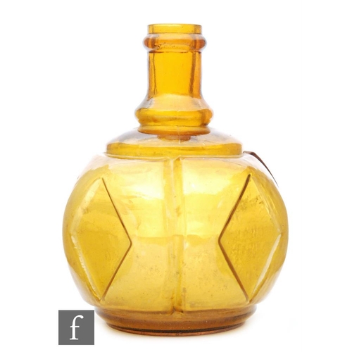 175 - A Haywards amber glass hand fire grenade of lozenge panel and ribbed form, height 15cm