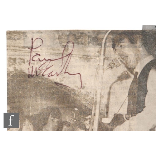 220 - A signed Paul McCartney cutting, the newspaper cutting with photograph of Paul McCartney in the Cave... 