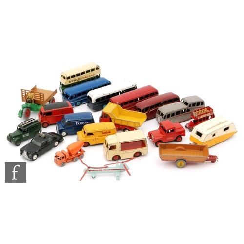 679 - A collection of playworn Dinky Toys diecast models, mostly buses and commercial vehicles, to include... 