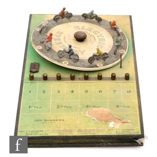 668 - An Electric Speedway board game by BGL London, the turn table mounted with eight lead riders, patent... 