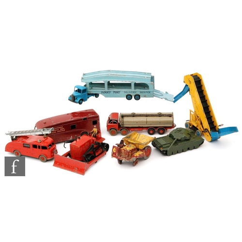 680 - A collection of twelve diecast models, mainly Dinky Supertoys, including #504 Foden 14 Ton Tanker wi... 