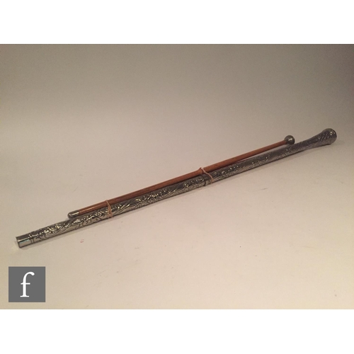 64 - A plated regimental parade stick named Egypt and a similar swagger stick and a carved regimental pla... 