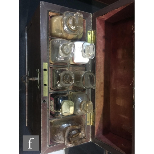 72 - A 19th Century mahogany apothecary box, the case opening to reveal an arrangement of seven bottles a... 