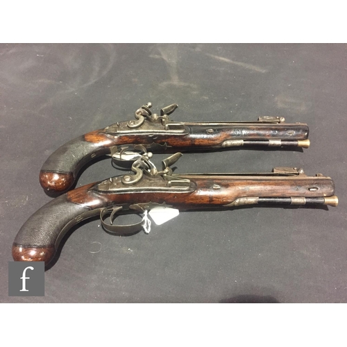 364 - A pair of late 18th Century flintlock officers pistols by D Egg, engraved lock plates, 22cm barrels ... 