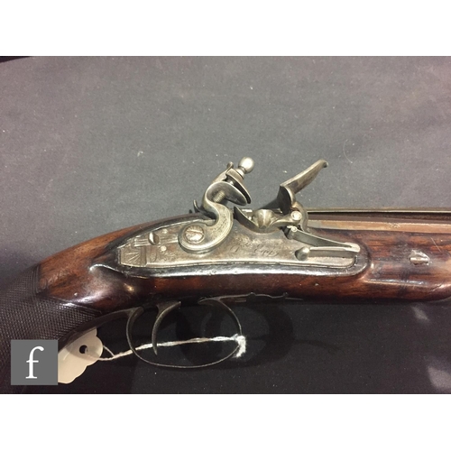 364 - A pair of late 18th Century flintlock officers pistols by D Egg, engraved lock plates, 22cm barrels ... 