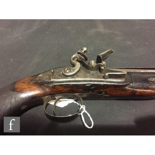 364 - A pair of late 18th Century flintlock officers pistols by D Egg, engraved lock plates, 22cm barrels ... 