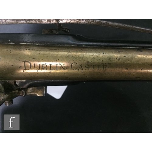 369 - An early 19th Century flintlock pistol, tower and GR mark to lock, brass trigger guard and the butt ... 