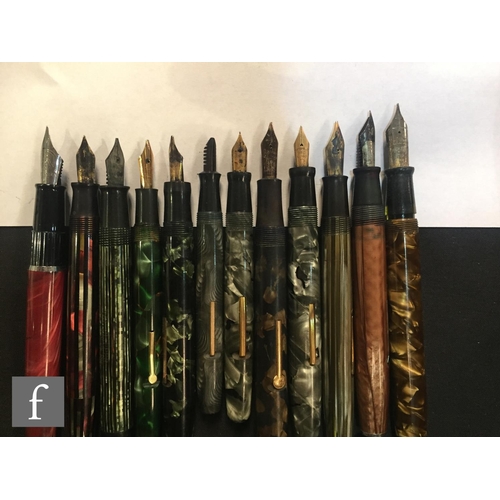 165 - A Unique pen, a Blackbird self filler, a clipper fountain pen and various other marbled effect fount... 