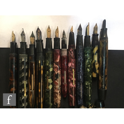 165 - A Unique pen, a Blackbird self filler, a clipper fountain pen and various other marbled effect fount... 