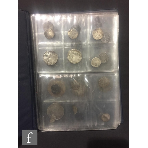 445 - Roman to Victoria - A small album containing denarius, hammered pennies , cut half's, groats etc (qt... 