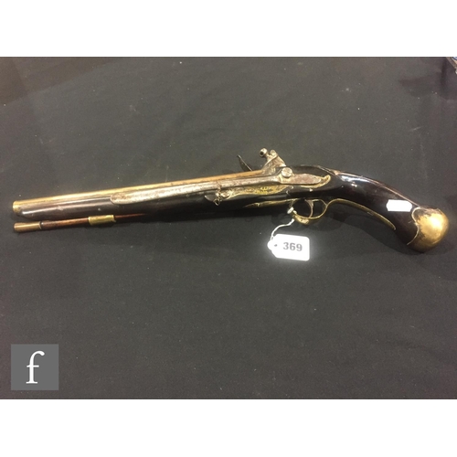 369 - An early 19th Century flintlock pistol, tower and GR mark to lock, brass trigger guard and the butt ... 