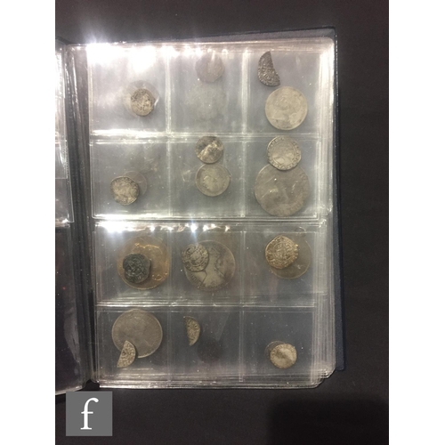 445 - Roman to Victoria - A small album containing denarius, hammered pennies , cut half's, groats etc (qt... 