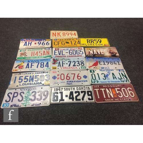 53 - A collection of American licence number plates from the 1990s and later to include various states su... 