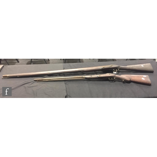 339 - An Indian single barrel musket with ram rod, length 112cm and a similar musket, length 71cm barrel (... 