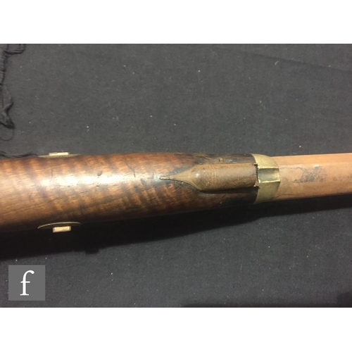 340 - An Indian flintlock blunderbuss with ramrod and brass trigger guard, length 45cm and a single barrel... 