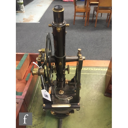 75 - An early 20th Century Troughton & Sons theodolite in a gun metal grey lacquered finish in original w... 