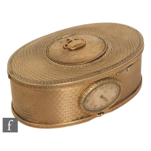355 - A 19th Century continental silver gilt singing bird box, the engine turned oval box with a watch to ... 