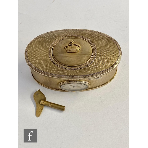 355 - A 19th Century continental silver gilt singing bird box, the engine turned oval box with a watch to ... 
