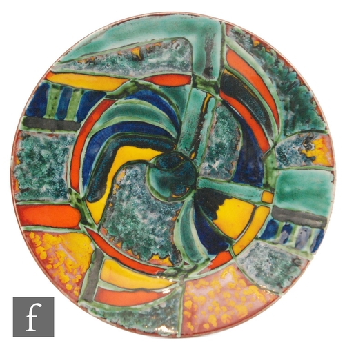 105 - A later 20th Century Poole Pottery Studio plaque decorated with an abstract design in mixed palette,... 