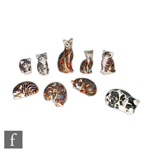 24 - Nine Royal Crown Derby Cat paperweights to include Catnip Kitten, made exclusively for the collector... 