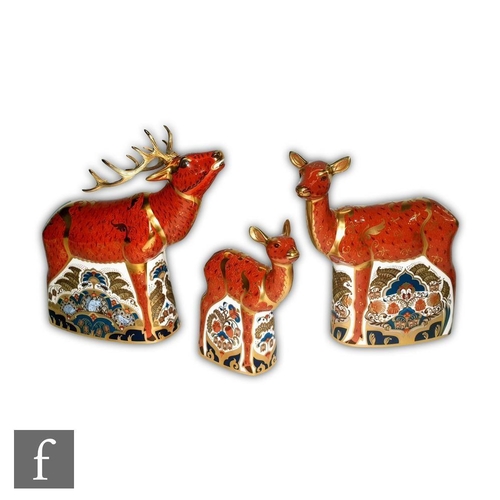 28 - A Royal Crown Derby Sherwood set comprising Stag paperweight, Hind paperweight and Fawn paperweight ... 