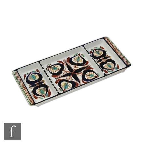 32 - A Royal Crown Aluminia Faience rectangular serving dish decorated in a repeat pattern designed by Ma... 