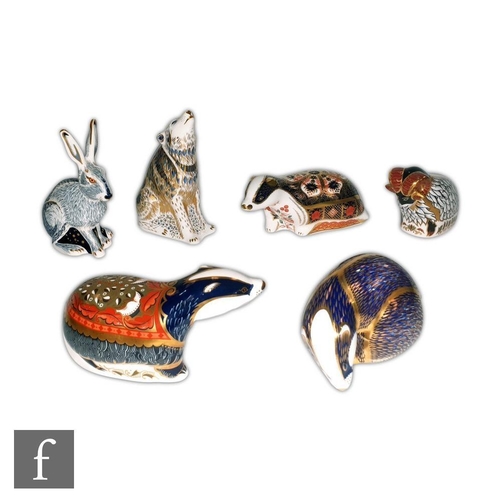 4 - Six assorted Royal Crown Derby paperweights comprising Old Imari Badger commissioned for Peter Jones... 