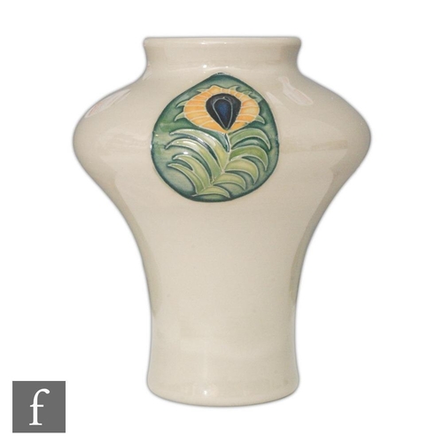 75 - A Moorcroft Pottery vase of inverted baluster form decorated in the Peacock Feathers pattern designe... 