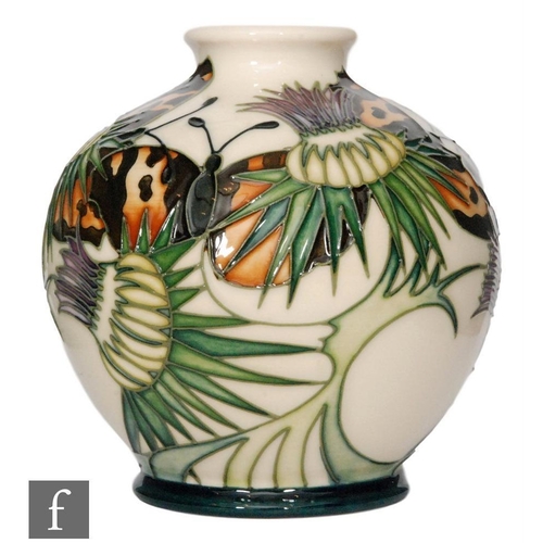 83 - A Moorcroft Pottery vase of footed ovoid form decorated in the Northumberland pattern designed by Em... 