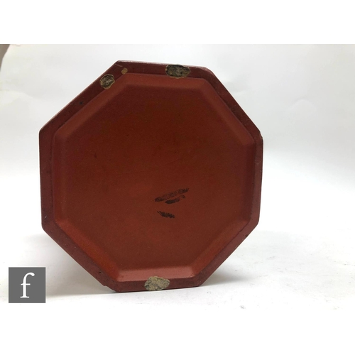 168 - A Chinese late Qing Dynasty (1644-1912) Yixing vase, the octagonal meiping vase relief moulded to th... 