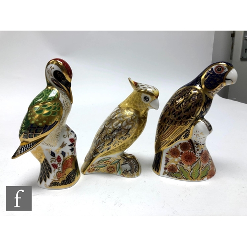 20 - Six Royal Crown Derby bird paperweights comprising Amazon Green Parrot numbered 774 of 2500, Lorikee... 
