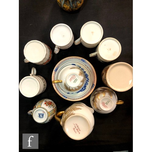 57 - A collection of assorted 18th and 19th Century coffee cups to include Derby, Flight Barr and Barr Wo... 