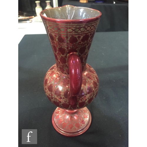 52 - A late 19th Century French ewer decorated in the Hispano-Moresque style by Emile Balon, with painted... 