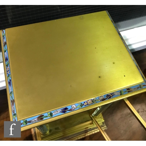 927 - A late 19th Century French ormolu and champleve enamel clock garniture, the four sided glass panel c... 