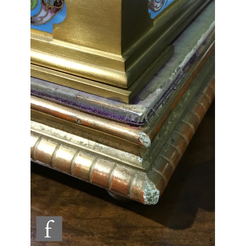 927 - A late 19th Century French ormolu and champleve enamel clock garniture, the four sided glass panel c... 