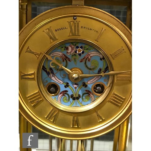 927 - A late 19th Century French ormolu and champleve enamel clock garniture, the four sided glass panel c... 