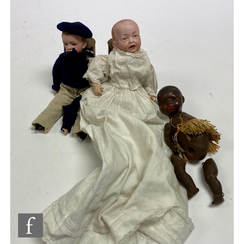 193 - A collection of assorted bisque head dolls, comprising an early 20th Century Gebruder Heubach bisque... 