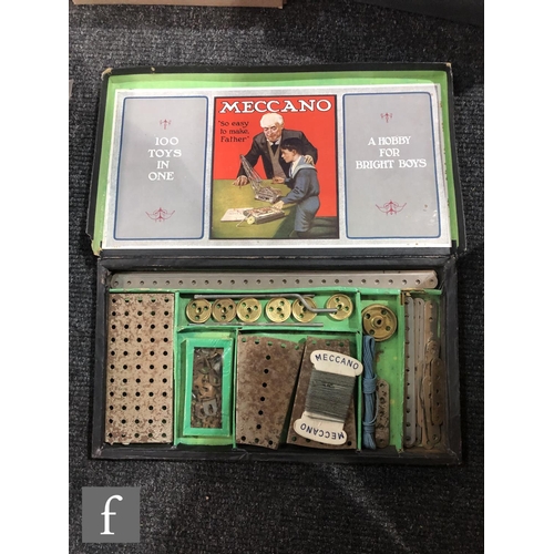 185 - A Meccano No. 1 Outfit contained in blue box with picture label to both sides of the lid, with instr... 