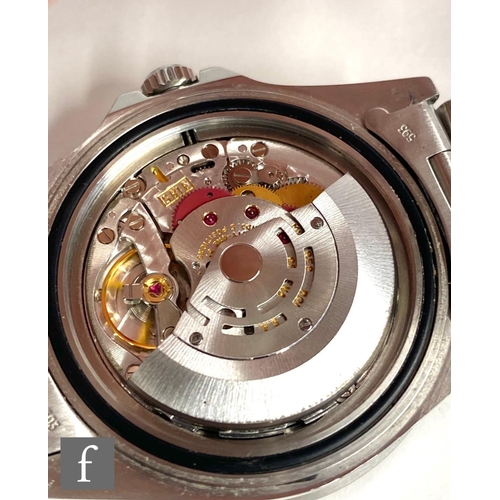 342 - A gentleman's stainless steel wrist watch, Rolex GMT Master II, 16710, 'Coke' bezel, black dial with... 