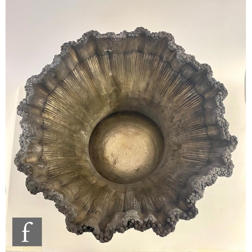 90 - A Georgian hallmarked silver campana urn shaped wine cooler shaped circular base below fruiting vine... 