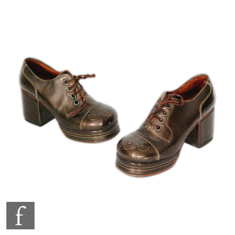 A pair of 1970s Anthony F Richardson men's platform stacked heel shoes in  brown leather with pierced