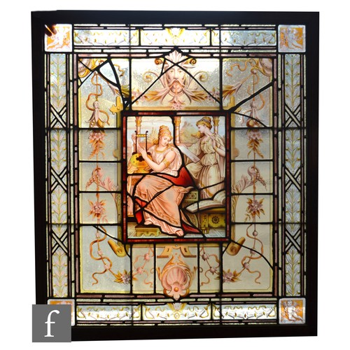 62 - Unknown - A late Victorian stained and painted leaded glass window, with central reserve filled with... 