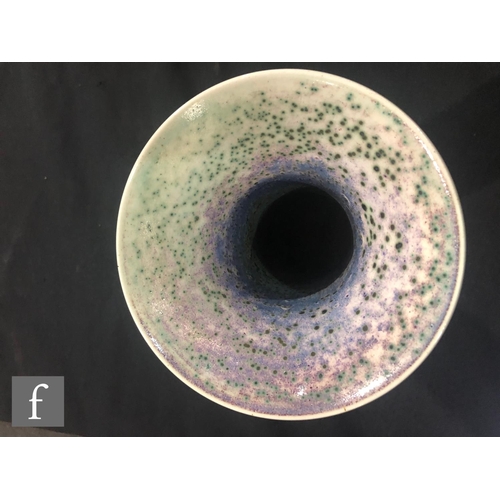 46 - Ruskin Pottery - A high fired vase of globe and flared shaft form decorated in a tonal lavender and ... 