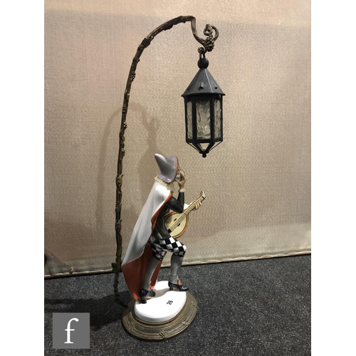 26 - K. Himmelstoss - Rosenthal - An early 20th Century table lamp modelled as Bajazzo, a harlequin stood... 